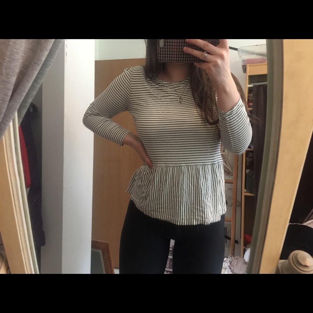 Long sleeved striped peplum top